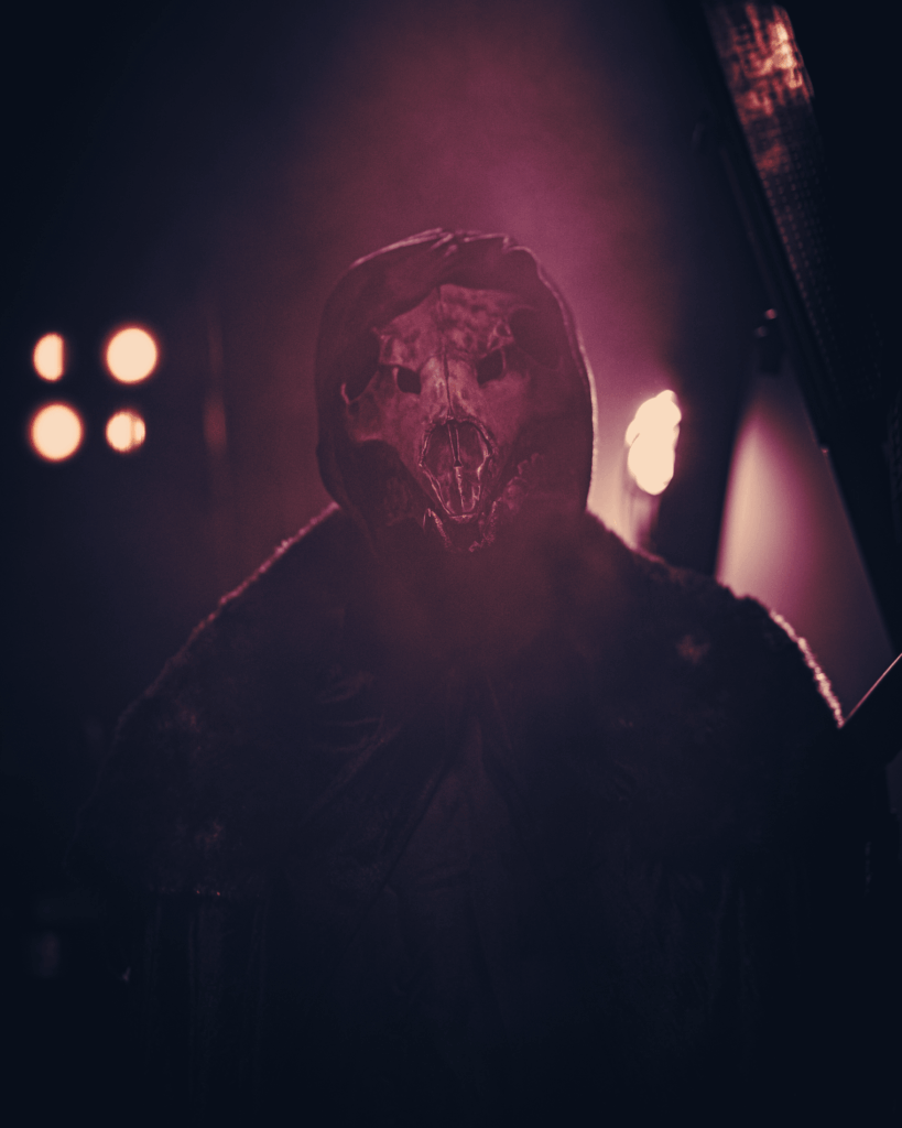 A demonic skeleton on stage during a Whitechapel concert.